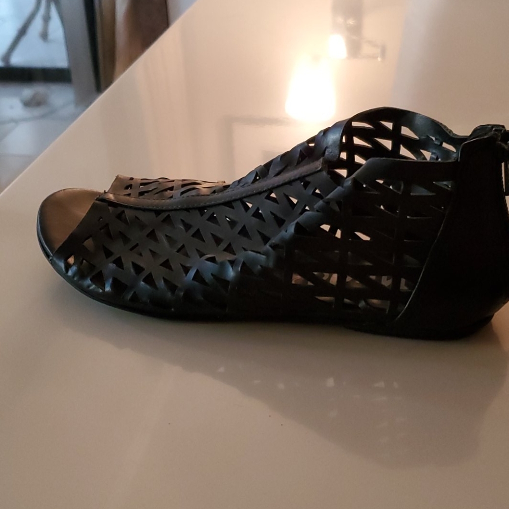 Black cutout booties flats